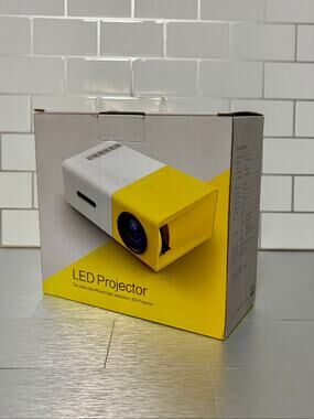 DeepLee DP300 Mini LED Projector Yellow Portable Home Theater HDMI USB SD